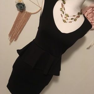 The Perfect Black Mini Dress With Opened Back!